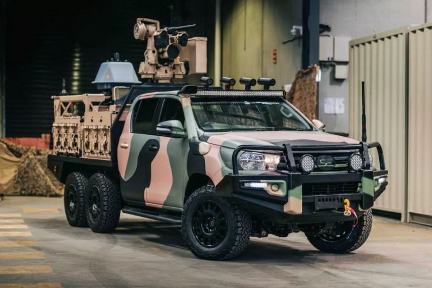 RADIO NEWS Siap Tempur, Toyota Hilux Disulap Menjadi Truk Militer 6×6