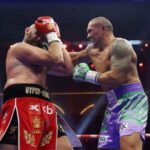 Haruskah Oleksandr Usyk Atau Tyson Fury Gantung Sarung Tinju Sekarang?