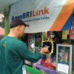 AgenBRILink Sukses Dekatkan Layanan Perbankan dengan Masyarakat di Tengah Kebun Kelapa Sawit